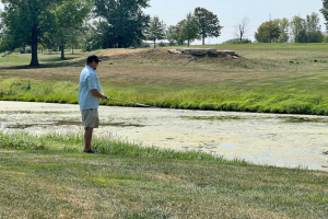 Brad Holdhusen fishing on the golf course? :)