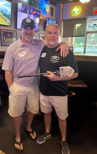 Clay Norkey Receives 2024 Father's Club Shovel Award 